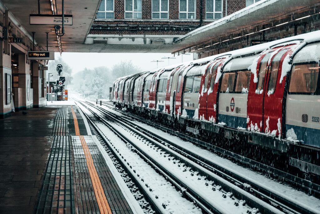 London underground train and station in the snow